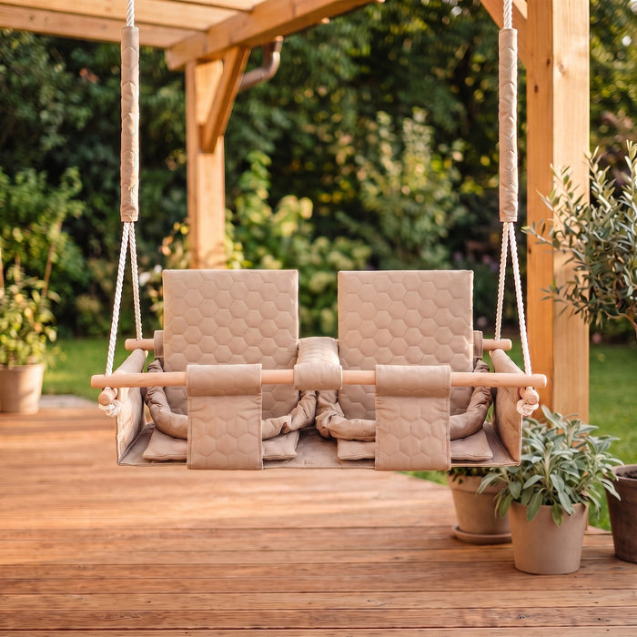 Baby twins swing - Waterproof and Secure Beige Double Seat, outdoors on a patio