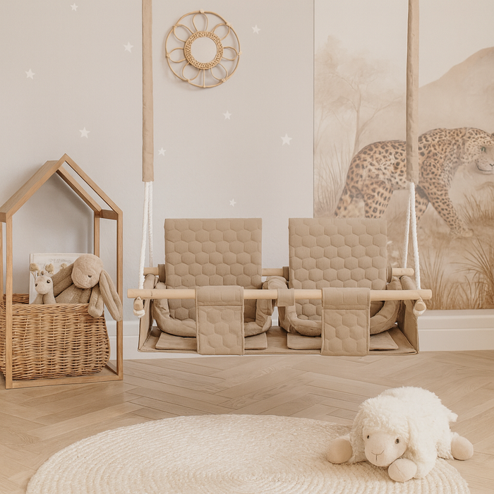 Baby twins swing - Waterproof and Secure Beige Double Seat, used indoors, in a bright children's room
