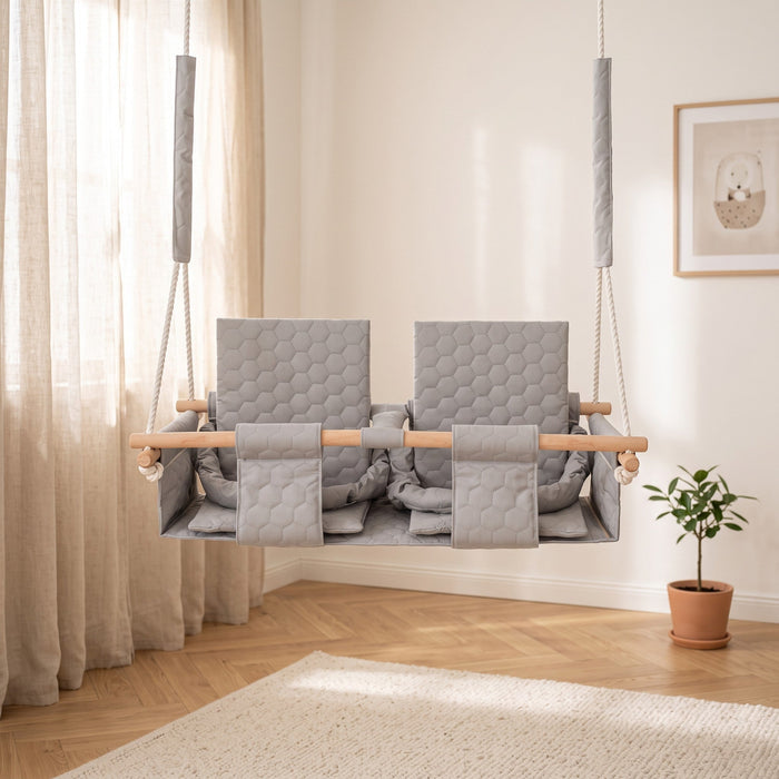 Baby twins swing - Waterproof and Secure Grey Double Seat, in a bright Scandinavian-style children's room