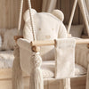 Indoor Swing For Toddler and Baby Beige, close-up of the velvet seat with bear design