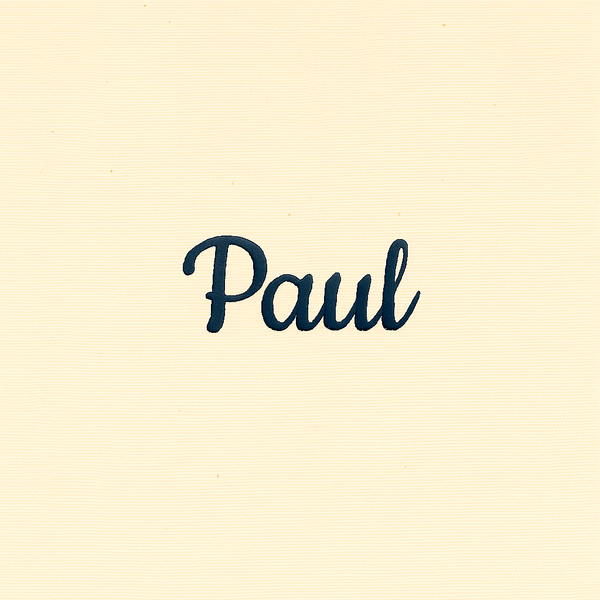 Name embroidery example, Paul in navy thread on cream fabric