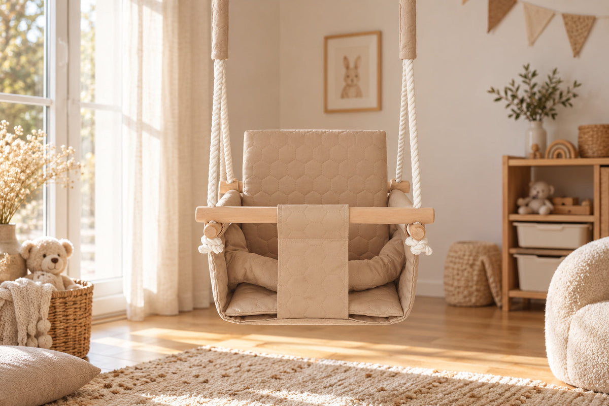 Waterproof baby swing in beige in a bright children's room