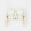 Twins Swing Secure Indoor Beige, front view with double seat, wooden bar and tassels
