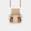 Waterproof secure baby swing Beige, front view on a light background
