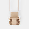 Waterproof secure baby swing Beige, front view on a white background with padded seat and wooden bar