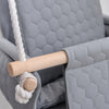 Waterproof secure baby swing Light Grey, close-up of the quilted fabric, beech wood bar and rope knot