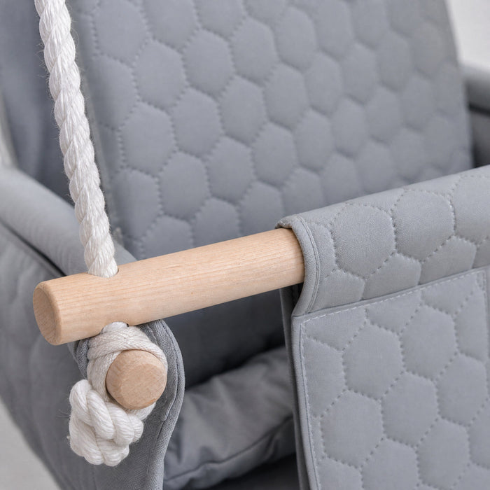 Waterproof secure baby swing Light Grey, close-up of the quilted fabric, beech wood bar and rope knot