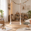 Waterproof Wooden Swing for Home and Garden - Dirt Resistant Beige, hanging in a bright children's room